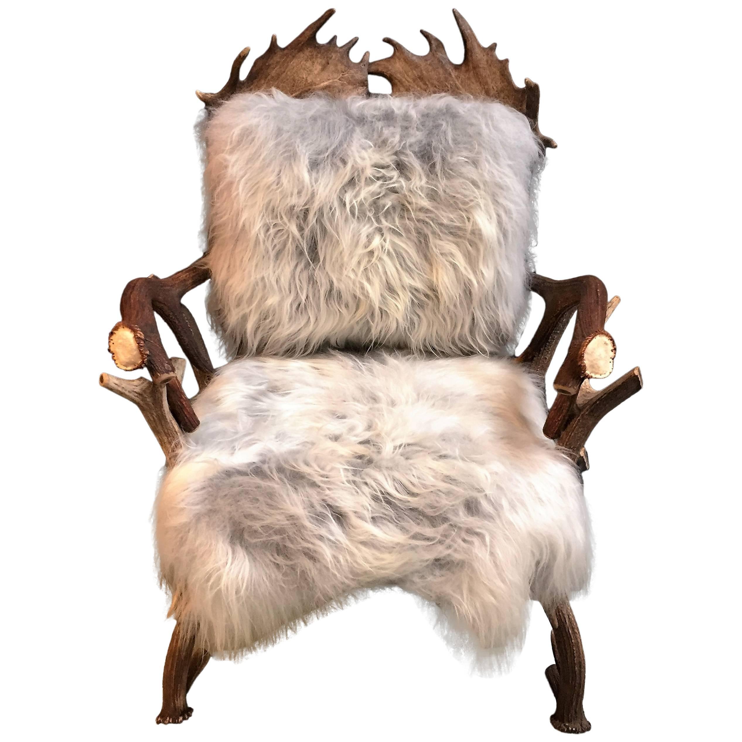 Antler chair with grey Iceland sheepskin upholstery