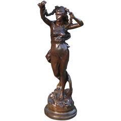 19th Century Bronze of a Standing Woman with Garland by Jean-Baptiste Germain