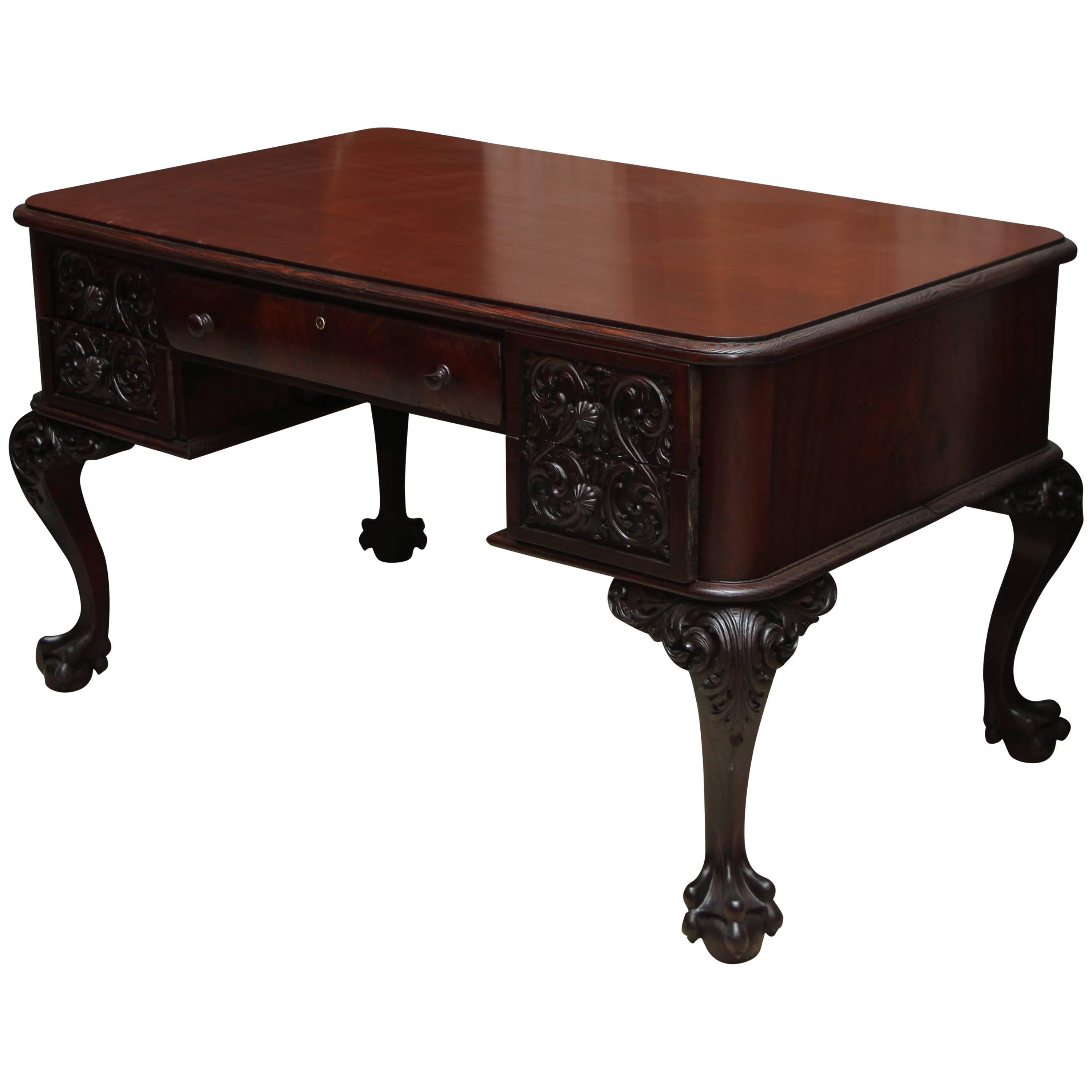 1910s Petite Flame Mahogany Carved Desk with Claw Feet