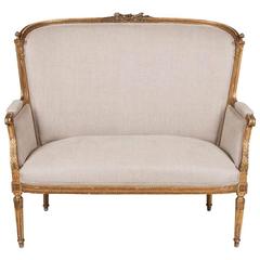 An elegant French giltwood carved canapé, circa 1900. 4