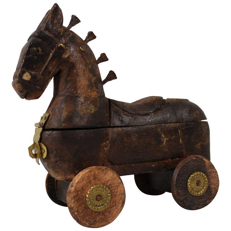 Folk Art Carved Wooden Horse on Wheels with Locking Storage Compartment