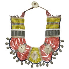 Folk Vintage  Necklace from Nagaland on a Wooden Panel
