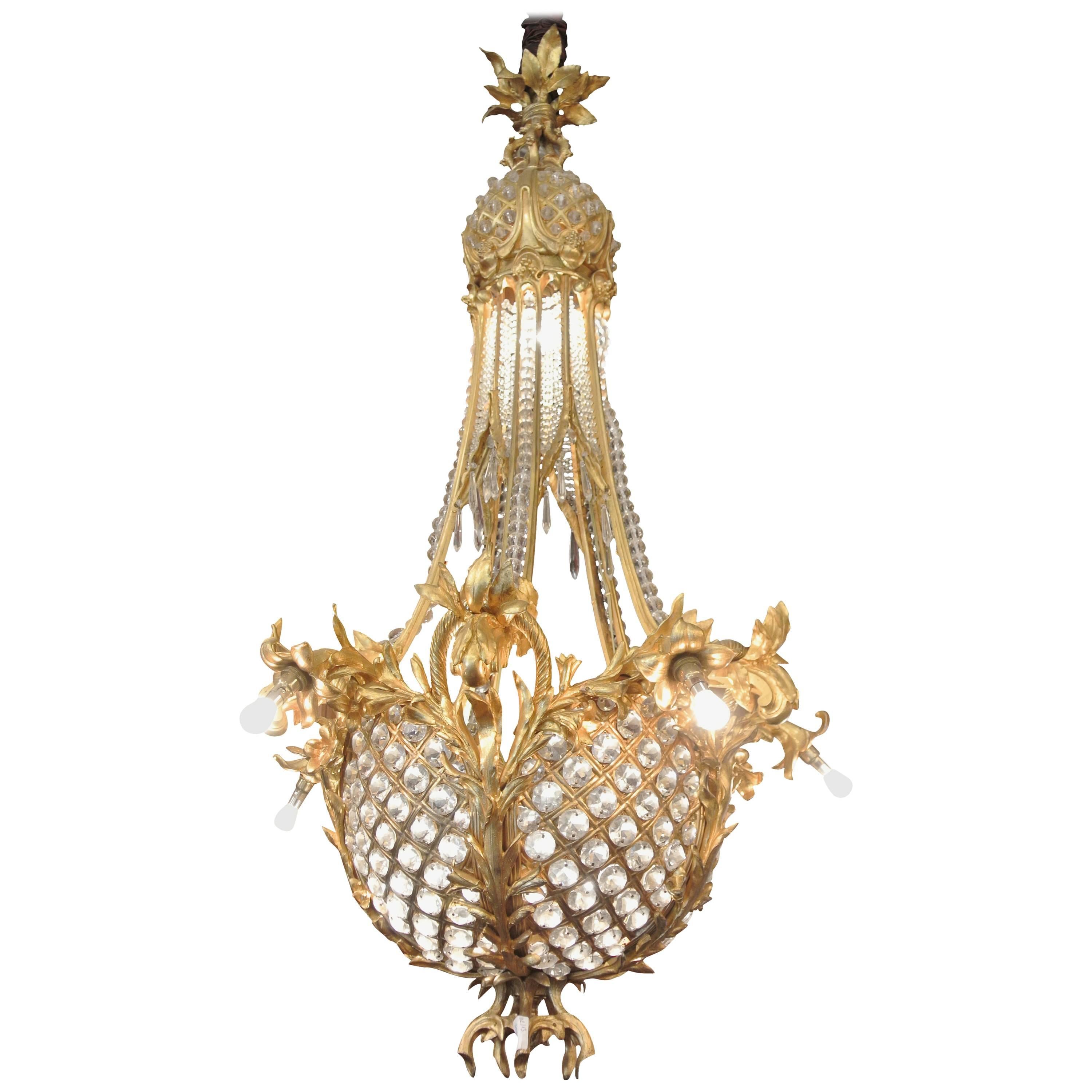 Exceptional Quality Large French Chandelier in Bronze Core and Cut Crystal.