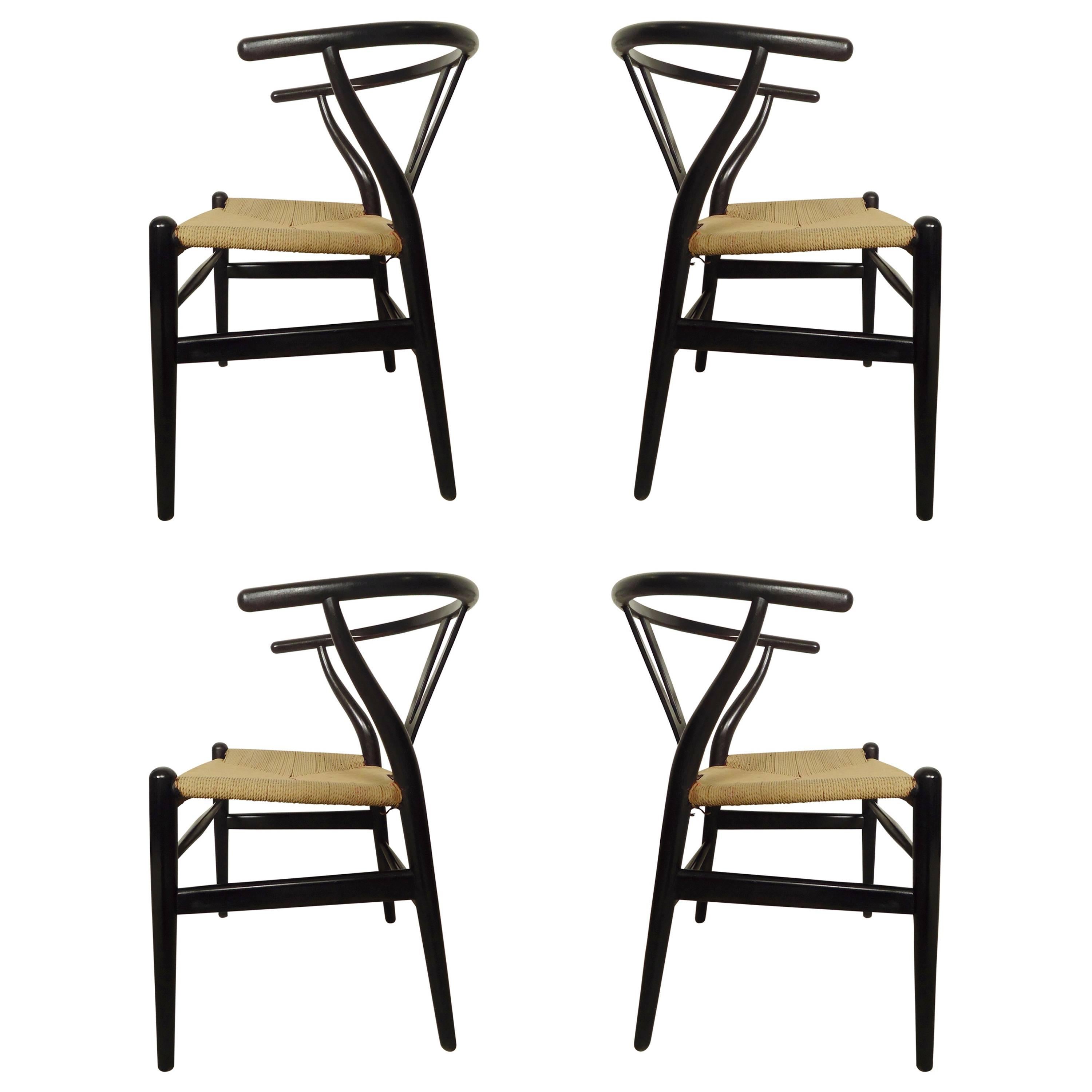 Set of Four Hans Wegner Wishbone Chairs For Sale
