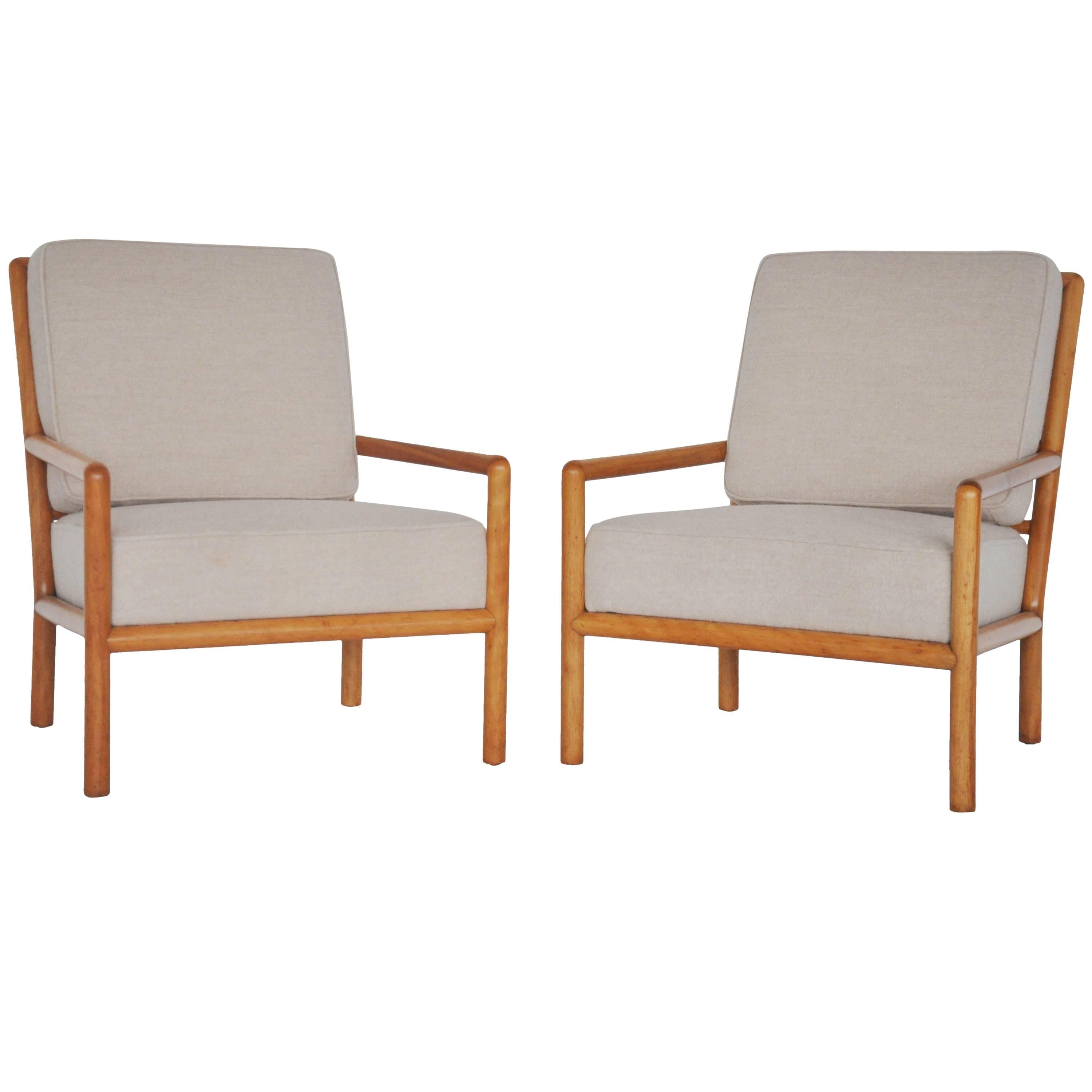 Pair of lounge chairs by T.H. Robsjohn-Gibbings, circa 1950s. Fully restored and reupholstered in soft wool fabric.