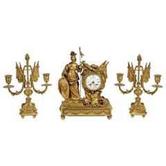 French Napoleon III Gilt Bronze Figural Three-Piece Clock Garniture