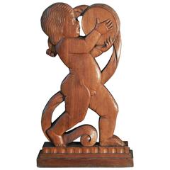 "Putto with Tambourine and Scroll, " Larger Art Deco Sculpture in Carved Walnut