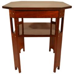 Art deco solid mahogany table in arts and crafts style.