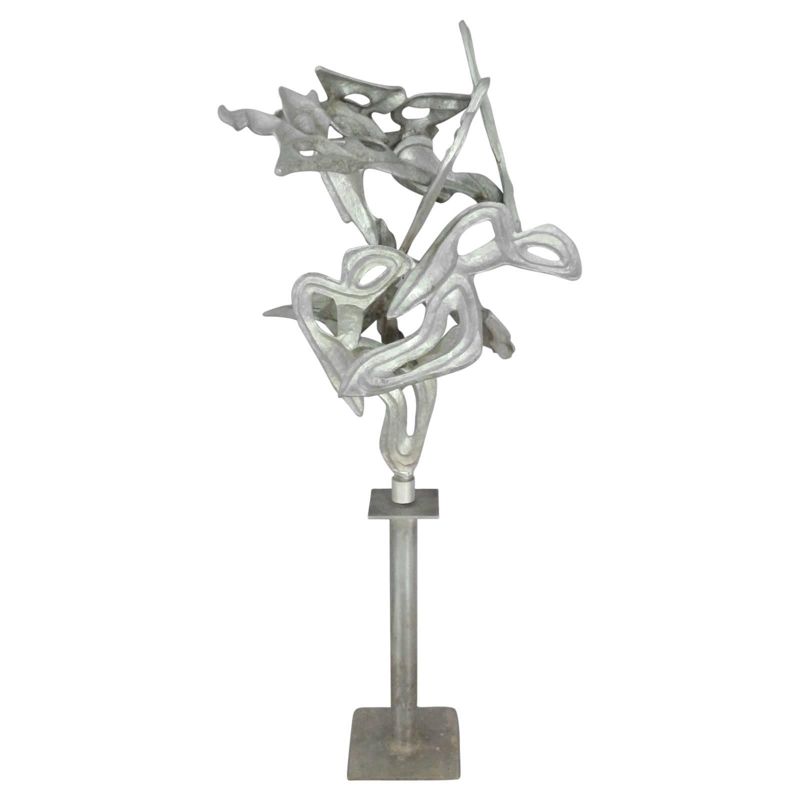 Cast and welded organic form abstract aluminum sculpture signed Joseph 