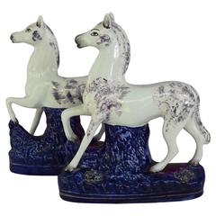 Antique Pair of Staffordshire prancing horses