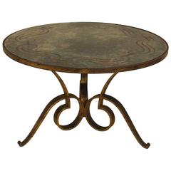 1940s French Circular Hand-Hammered Iron Coffee Table with Verre Églomisé Top