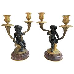 Pair of Figural Bronze, Gilt and Marble Neoclassical Candelabras