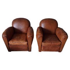 Distressed Pair of Art Deco French Cognac Leather Club Chairs, 1930s 