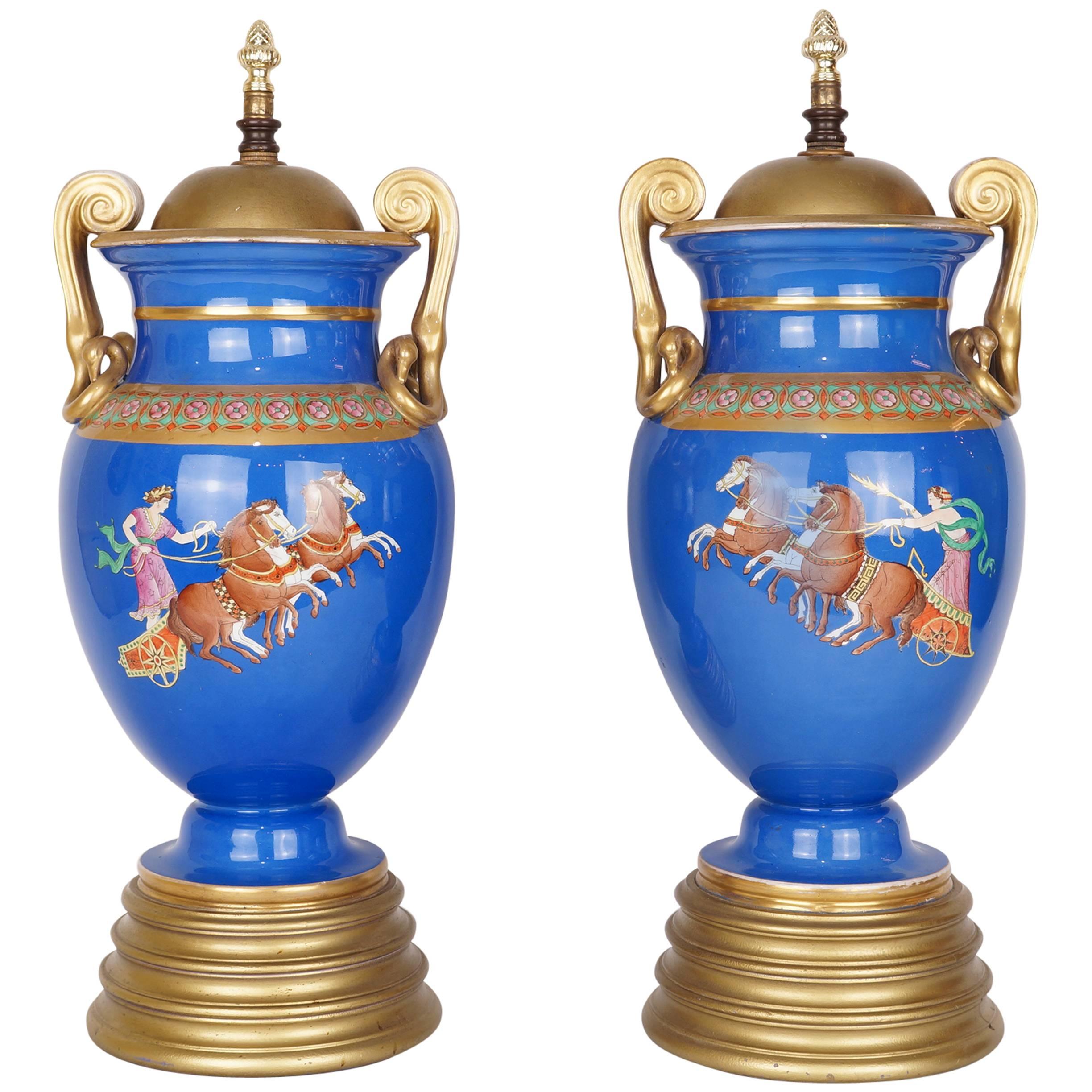 Pair of Neoclassical Painted Blue Porcelain Lamp Bases with Chariots Scenes