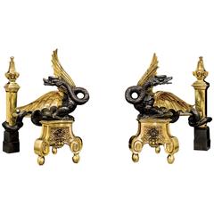 A very rare pair of gilt and bronze early 19th century wyvern andirons