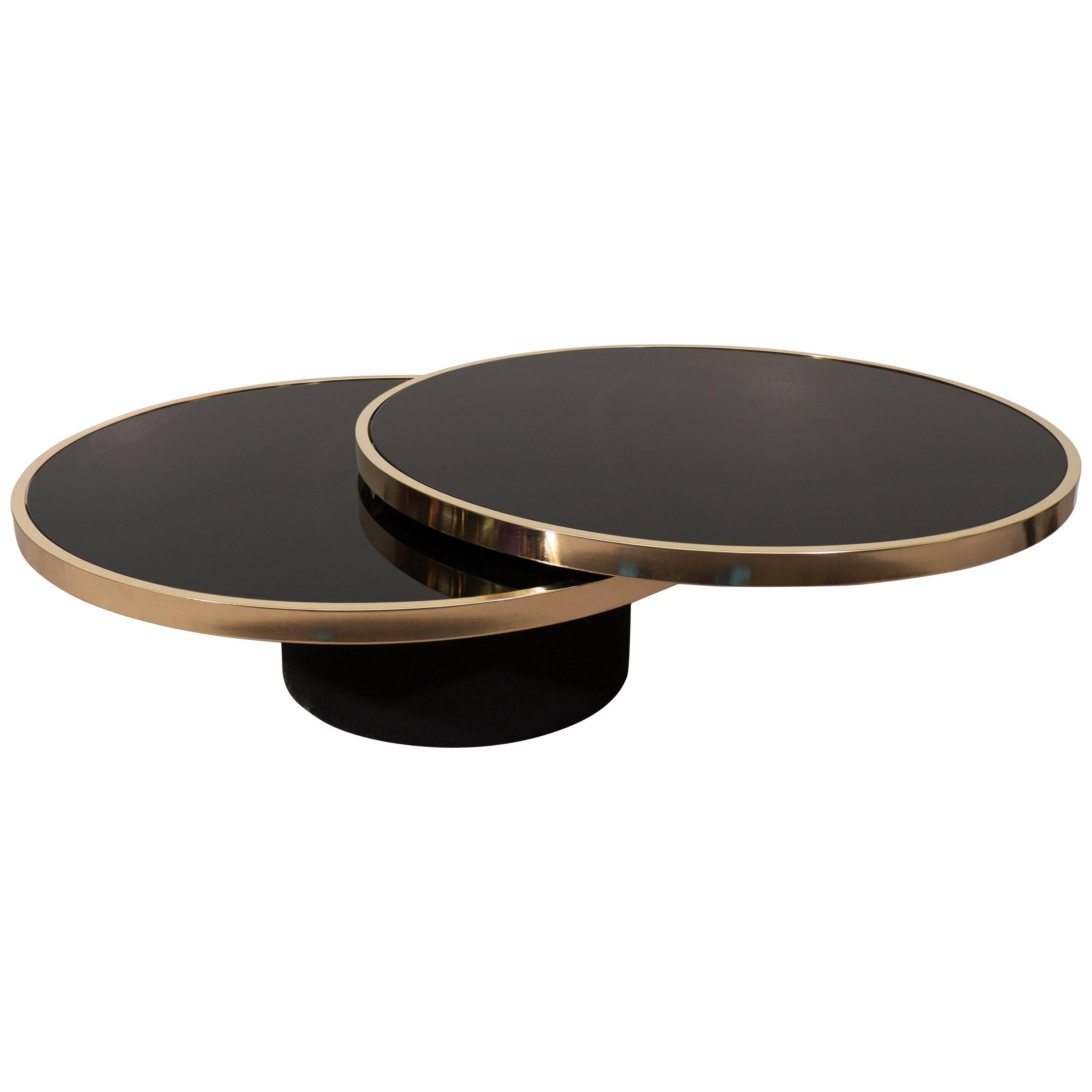Black Glass and Brass Swivel Cocktail Table by the Design Institute of America