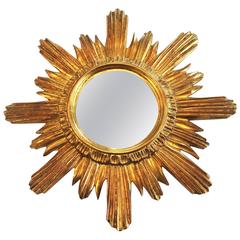French Art Deco Carved and Gilded Sunburst Mirror