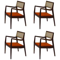 Four Jens Risom Playboy Chairs in Walnut and Cane