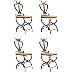 Four Wrought Iron Veranda Chairs by Elvira Salame