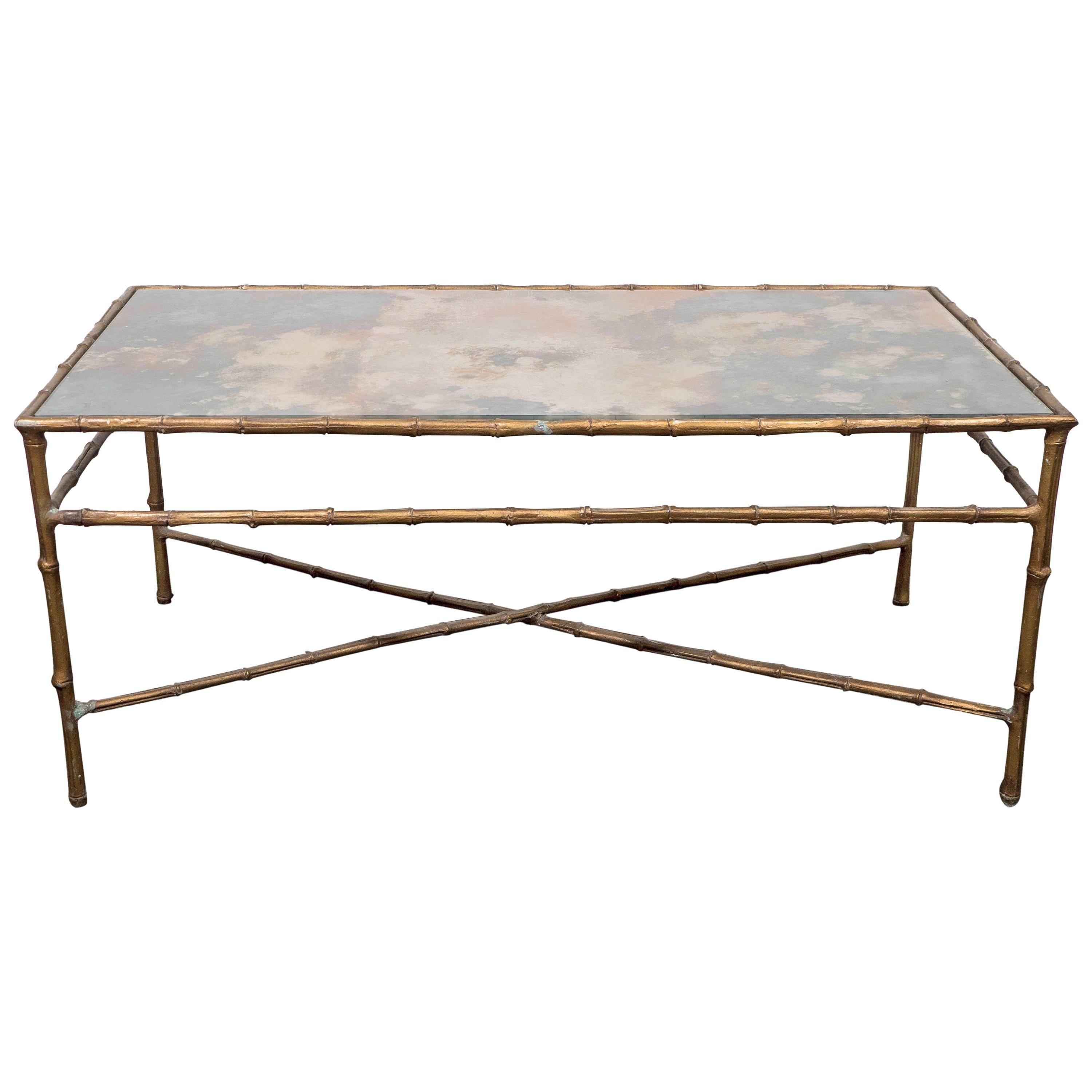 A Maison Baguès Style Faux Bamboo Brass Coffee Table with Smoked Glass Top