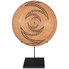Woven Rattan Zigzag Disc Sculpture on Metal Stand