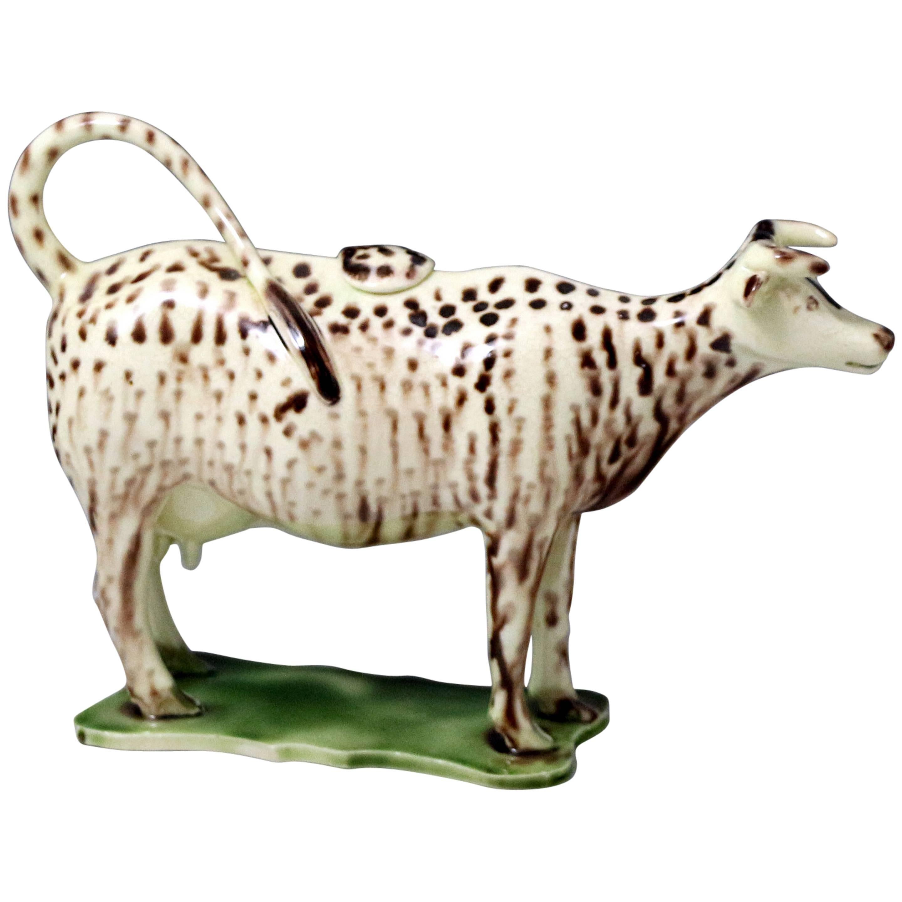 Early English pottery creamware bodied cow creamer figure  For Sale