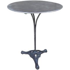 Polished French Bistro Table with Cast Iron Base