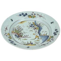 An English Delft Chinoiserie Charger, 18th Century