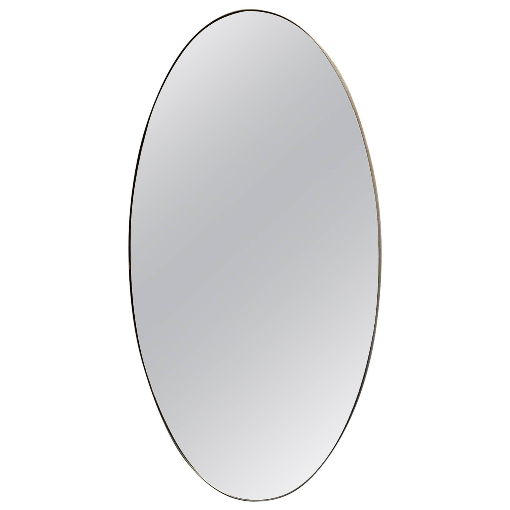 1950s Elegant Large Oval Mirror with Brass Frame For Sale at 1stDibs