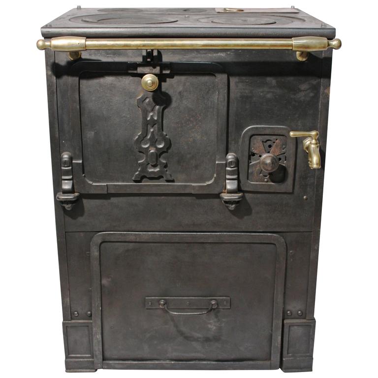 19th Century Small Cast Iron Stove at 1stdibs