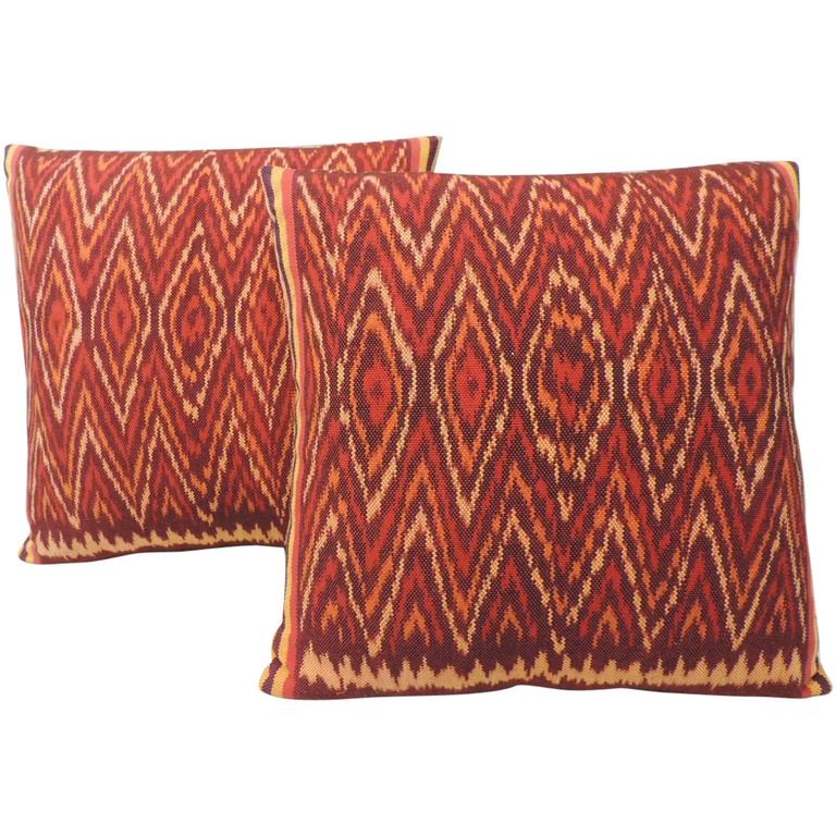 Pair of Red and Orange Vintage Ikat Woven Pillows at 1stdibs