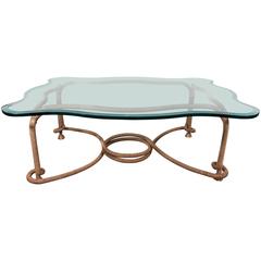 Glass Top Coffee Table with Distinctive Gilt Coiled Frame