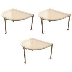 Set of three semi-circular bronze side tables with frosted glass top. 7