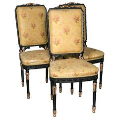 Antique Set of Ten Ebonized and Gilt Decorated Dining Chairs by Maison Jansen