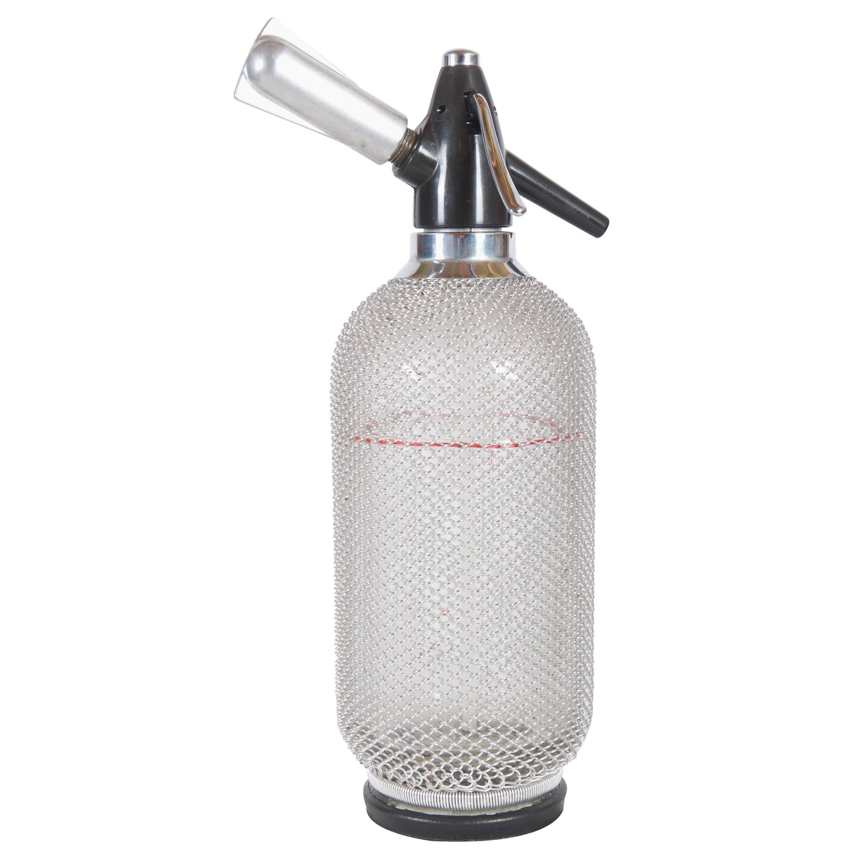 Soda Siphon Seltzer Bottle with Wire Mesh Metal Around Glass For Sale