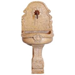 Carved Marble Wall Fountain with Iron Spout from Italy
