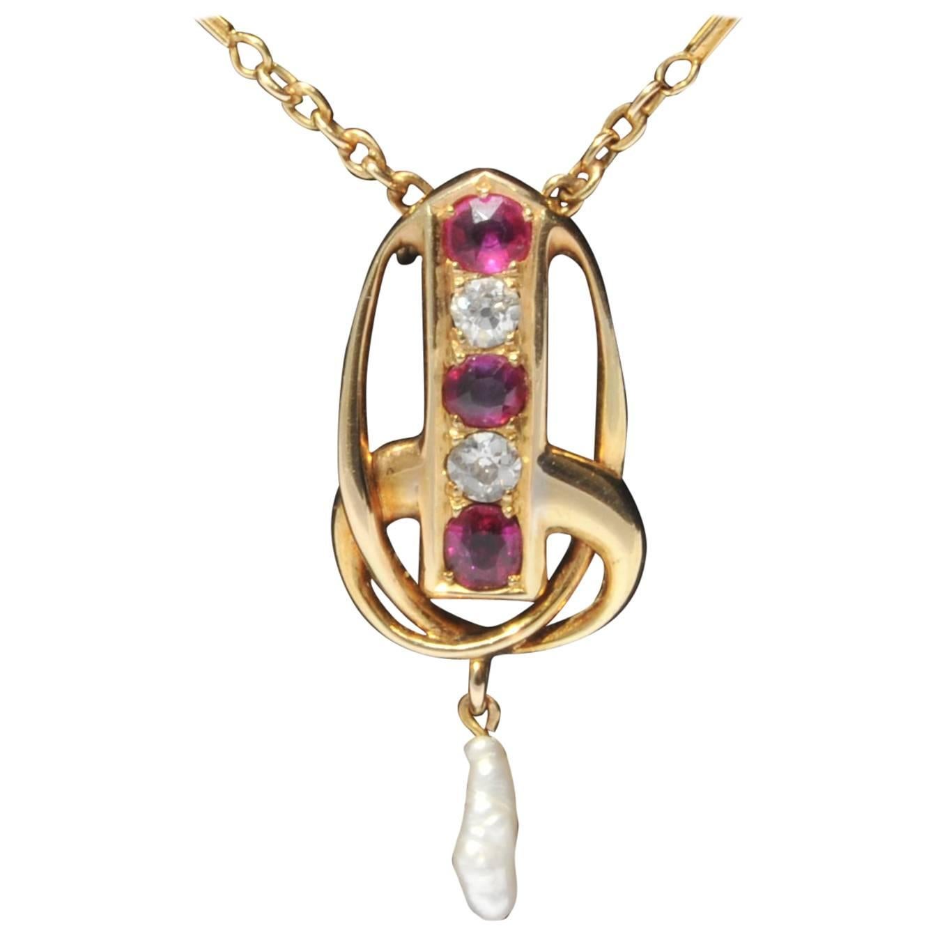 Archibald Knox for Liberty & Co Art Nouveau Gold, Ruby and Diamond Pendant For Sale