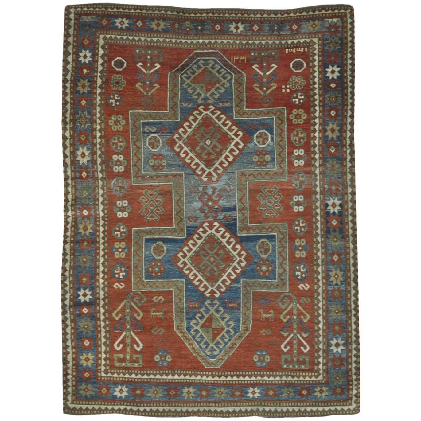 Antique Hand Knotted Wool Caucasian Kazak Area Rug For Sale