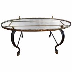 French 1940's Iron And Bronze Oval Cocktail Table By Maison Baguès