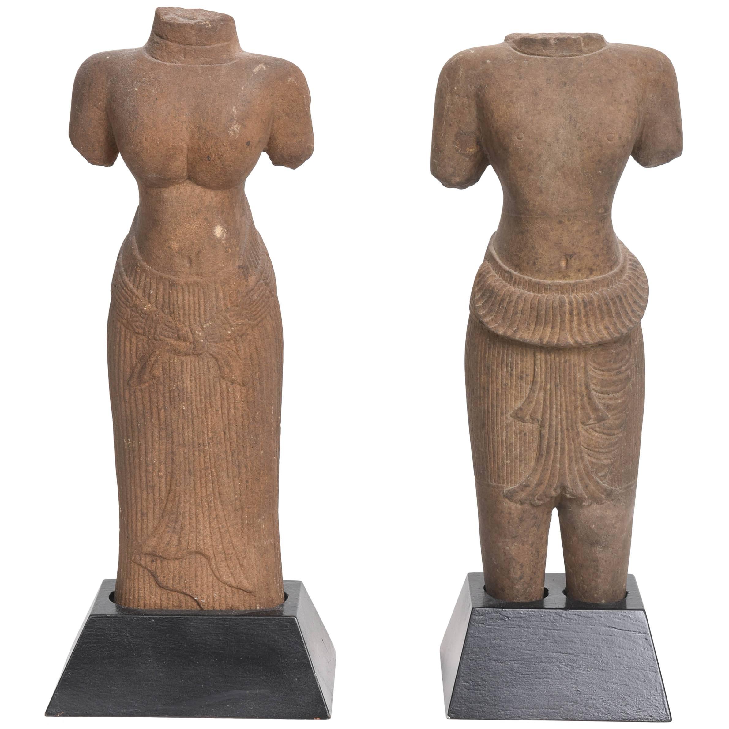 Pair of Khmer Sandstone Torsos of Uma and Vishnu, 11th c.