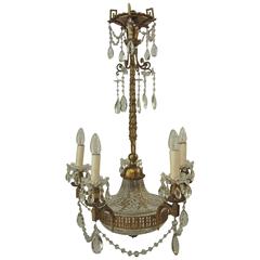 Antique An unusual cut glass and gilt brass chandelier