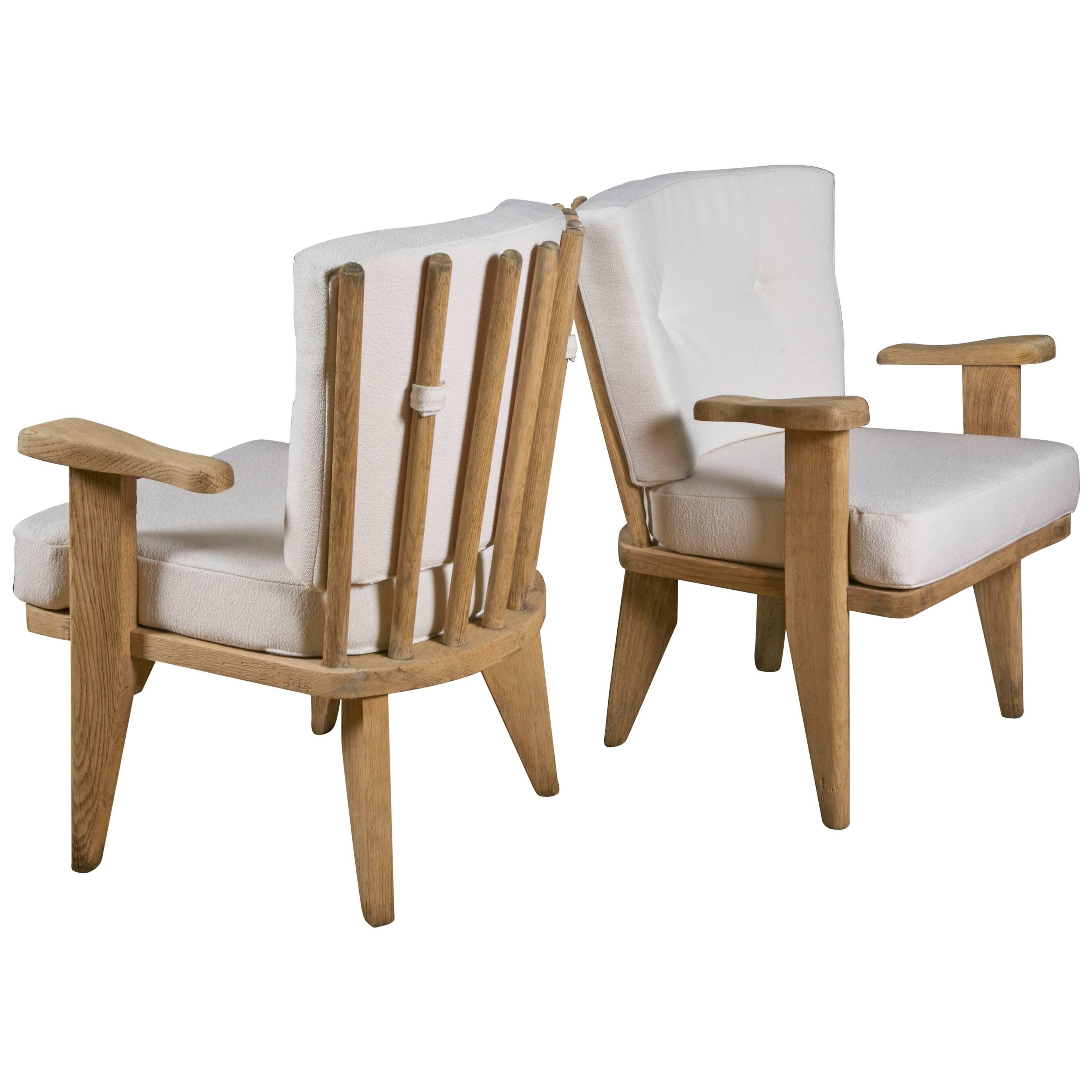 Pair of small armchairs by GUILLERME & CHAMBRON in clear soaped oak ca.1960