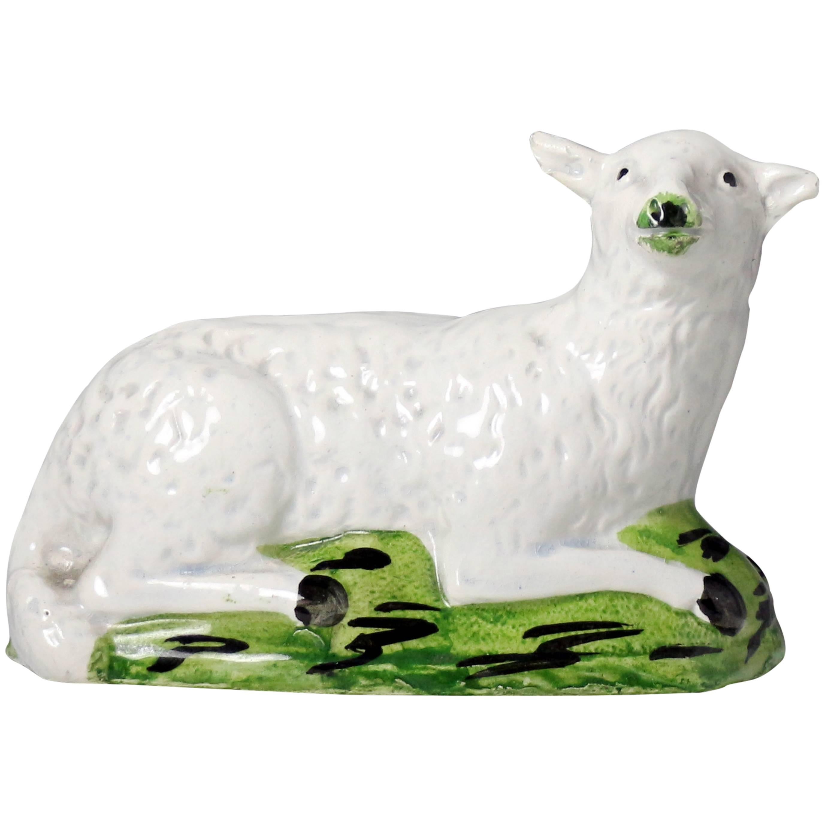 Antique English Pottery of a Ewe in a Green Base, Early 19th Century