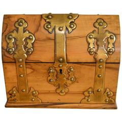A Victorian Period coromandel and brass mounted stationery casket. 