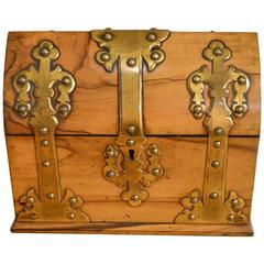 A Victorian Period coromandel and brass mounted stationery casket.