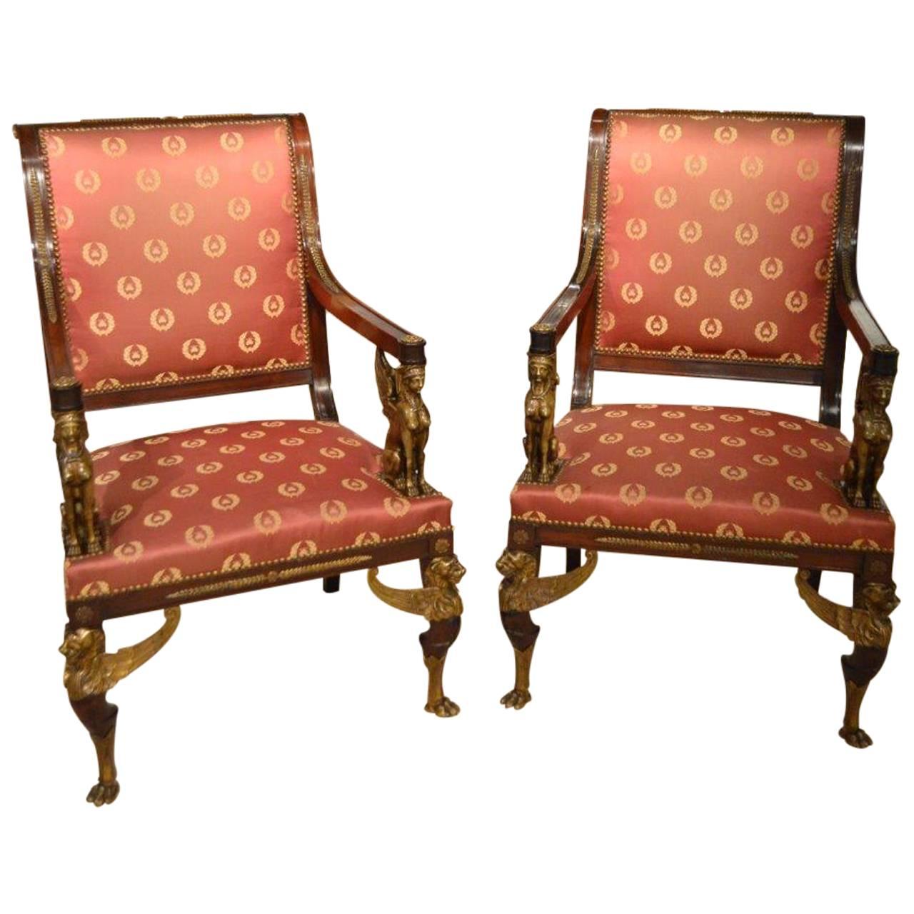 A fine pair of French Empire Revival mahogany & ormolu library chairs. 