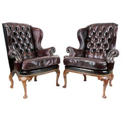 Pair of late 19th century walnut wing arm chairs