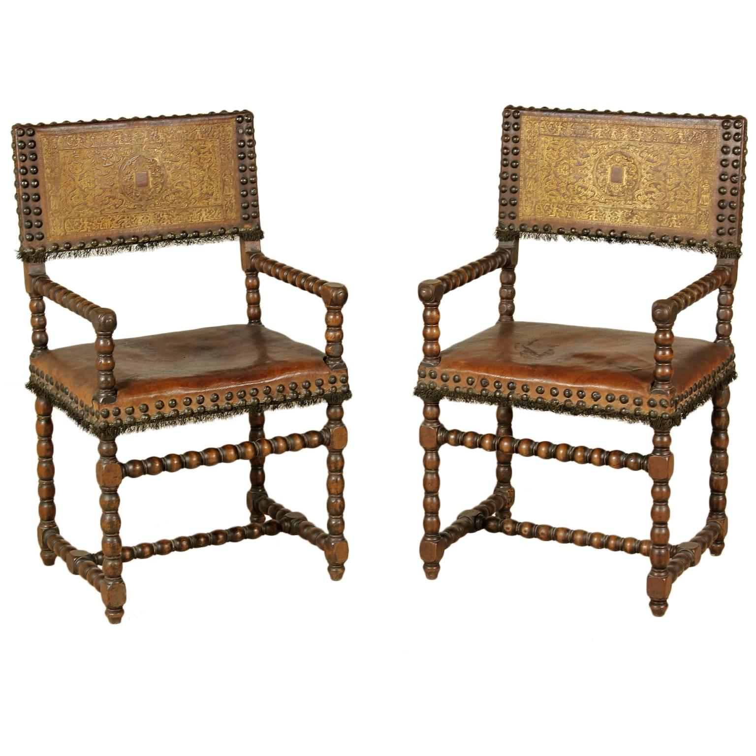 Two 17th Century Renaissance Walnut and Leather Armchairs