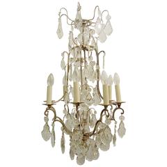 Antique A silver plated and crystal birdcage chandelier