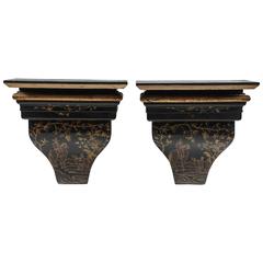Pair of 20th Century Asian Black and Gold Painted Wall Brackets